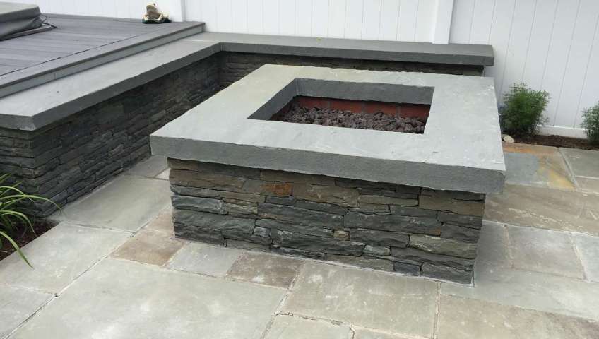 One piece blue stone coping for this fire pit New Paltz NY