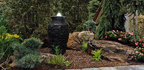 Aquascape garden water feature urn build in newpaltz NY, with landscape LED lighting