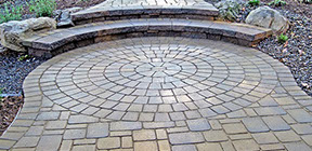 Cambridge Pavers landscape front walkway with circle kit and natural stones