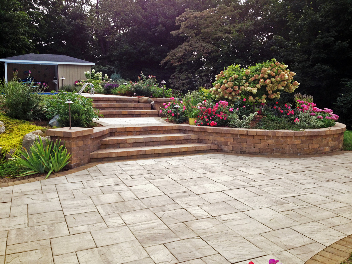 Backyard tranformation, patio, steps, retaining wall, landscaping, led landscape lighting, drip irrigation system. Wappingers Falls NY