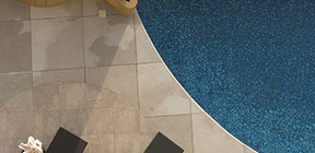 Custom natural stone patio around swimming pool millbrook ny 12545